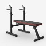 Adjustable weight bench dip station