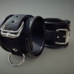 Black leather hand cuffs bondage