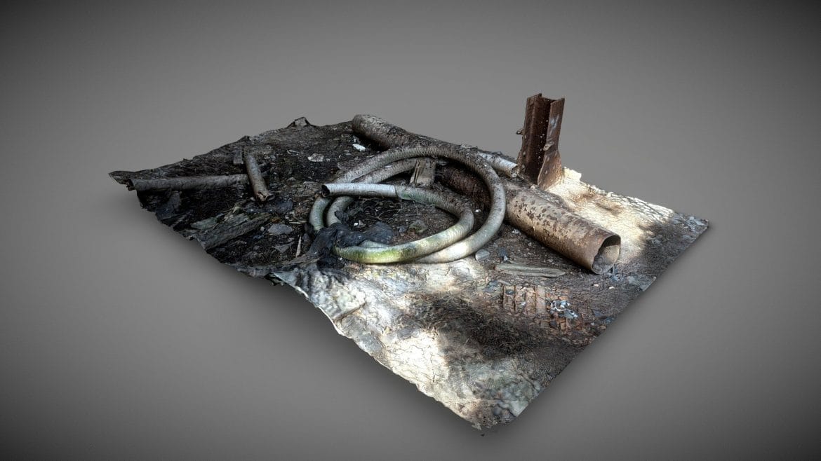 trash pile of pipe.thumb