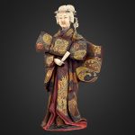 Japanese wood and ivory figure of a Geisha.