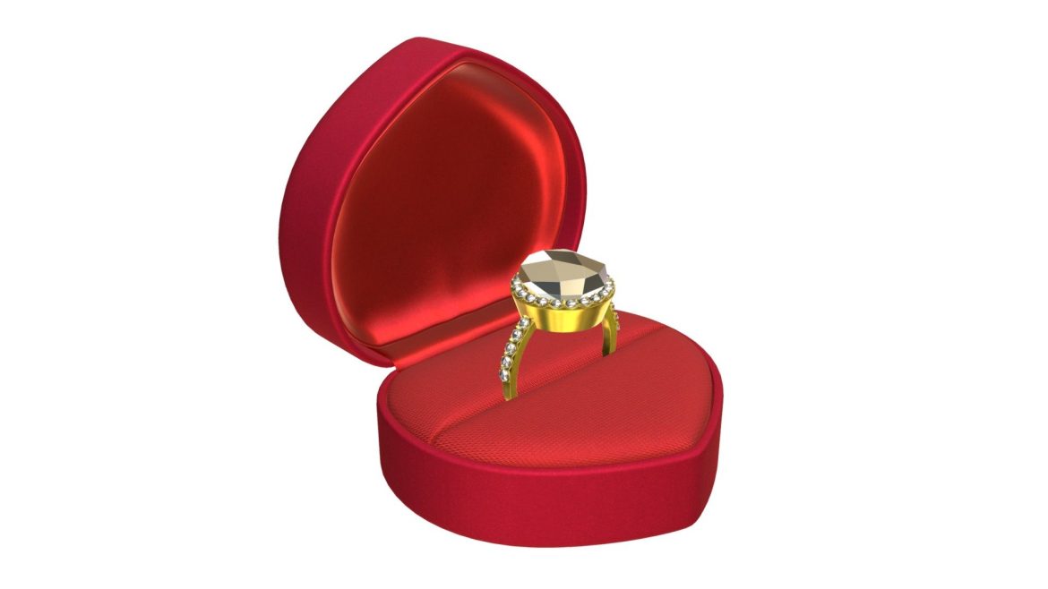wedding ring in a heart shaped box.thumb