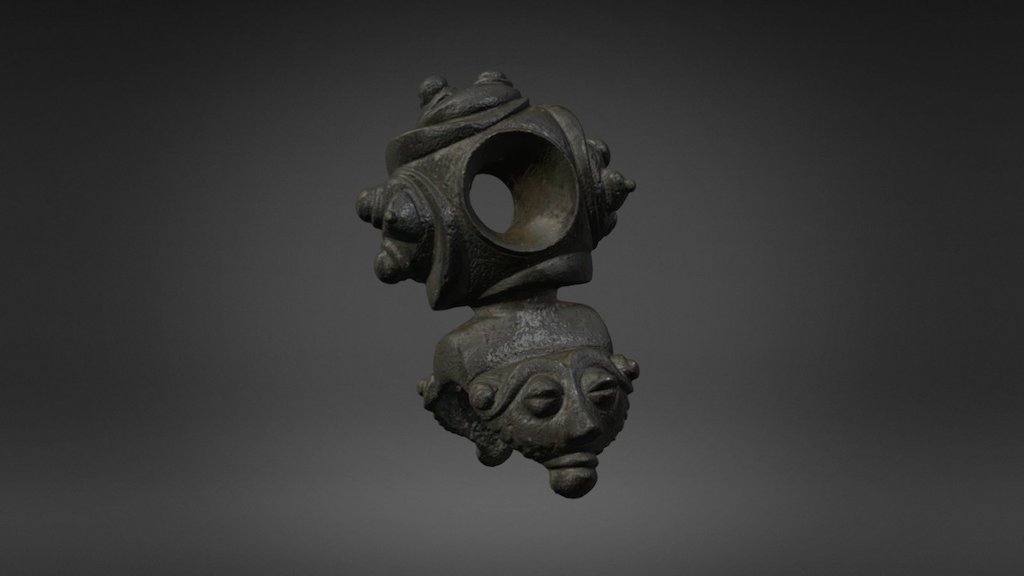 anneau passe guide decore de tetes humaines.thumb