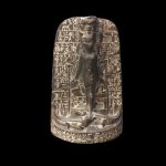 Black steatite cippus