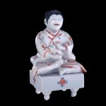 Boy on a Go Board 色絵碁盤唐子置物