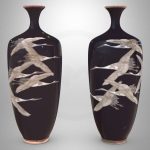 Two small vases ornamented with cranes in flight